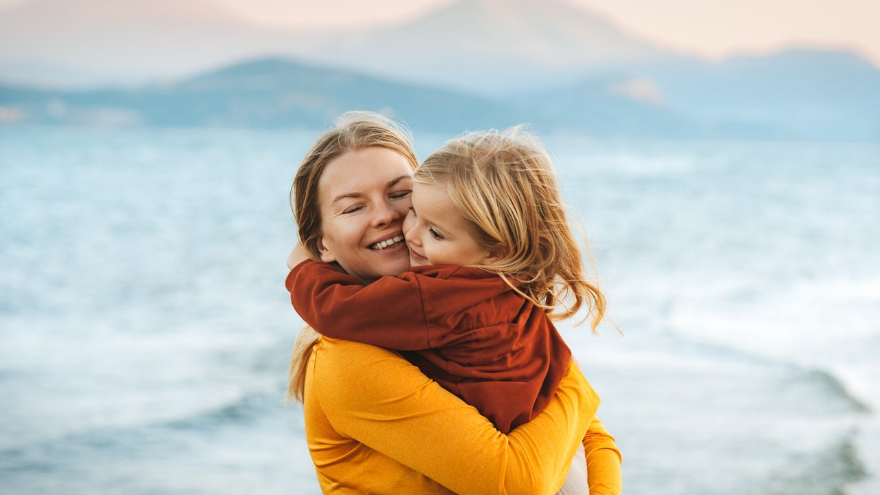 Mother-hugging-with-child-daughter-family-lifestyle-happy-emotions-travel-together-summer-vacations-woman-with-kid-walking-outdoor-at-the-lake-Mothers-day-holiday-1478481895_7952x5304.jpeg